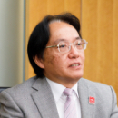 株式会社NTTドコモ 代表取締役副社長 阿佐美 弘恭
